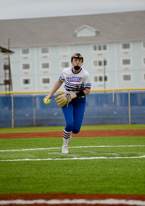 Galveston College pitcher Jenna Johnston winds up to throw a pitch during a game against Monroe College on Feb. 15, 2024, at the Lassie League Complex’s Carter Field in Galveston. On Saturday against Angelina College, Johnston hurled a one-hitter and won her 21st game of the season. (COURTESY PHOTO)