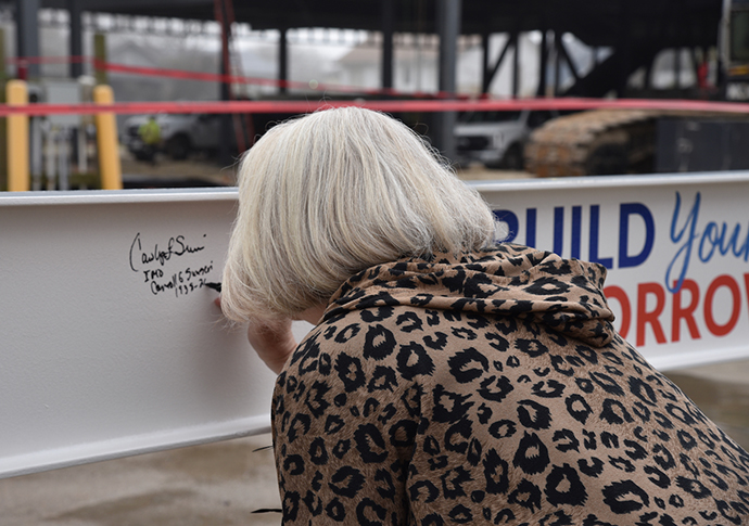 Board of Regent - Carolyn L. Sunseri signing beam