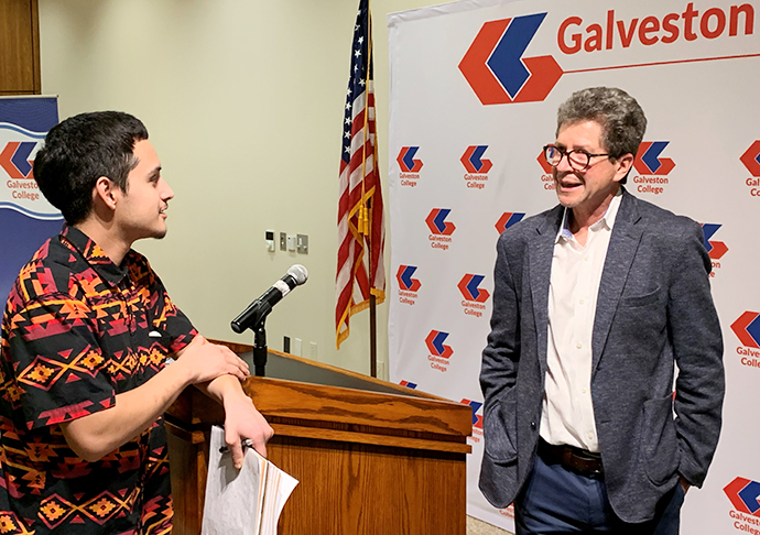 UC-Davis History Professor, Andrés Reséndez, Ph.D., speaking to a student at Galveston College
