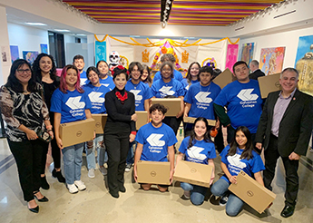 Galveston College Upward Bound program students received 15 laptops from the Mexican Consulate in Houston on Nov. 1 during the consulate’s Day of the Day celebration. In photo, GC Upward Bound program laptop recipients and GC staff with Consul General Alicia G. Kerber Palma of the Mexican Consulate in Houston.